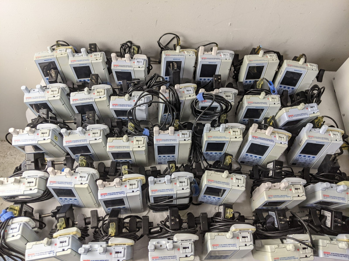 Lot of 40 Baxter Sigma Spectrum Infusion Pump w/ AC Adapter and Pole Clamp