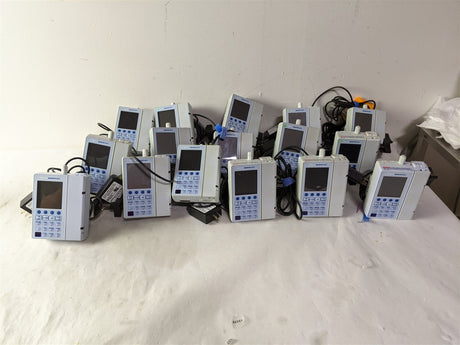 Baxter Sigma Spectrum Infusion Pump | Lot of 27 | Pole Clamps and AC Adapters